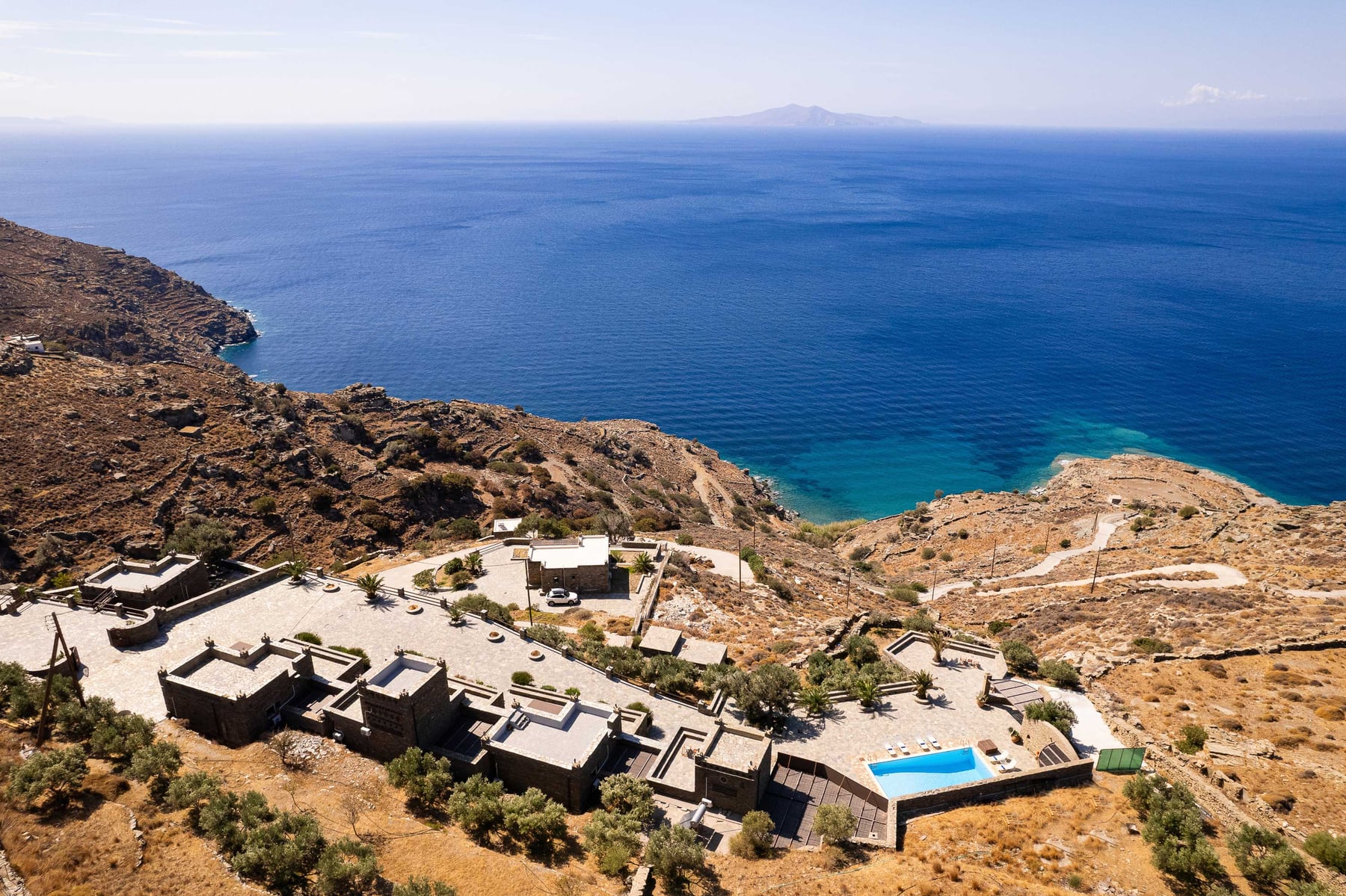 Andros Serenity's stone residences above the Aegean